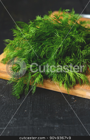 To use this stock image in your creative project, please select the size you need over to the right and click the "Add to Cart" button.
Your downloaded image will come with the Cutcaster watermark removed so don’t worry about the watermark you see on this page. bunch of fresh dill stock photo, bunch of fresh organic dill on a rustic wooden background by sutike