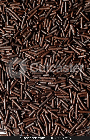 To use this stock image in your creative project, please select the size you need over to the right and click the "Add to Cart" button.
Your downloaded image will come with the Cutcaster watermark removed so don’t worry about the watermark you see on this page. Chocolate sprinkles background stock photo, Dark chocolate Chocolate sprinkles photographed from above by sutike