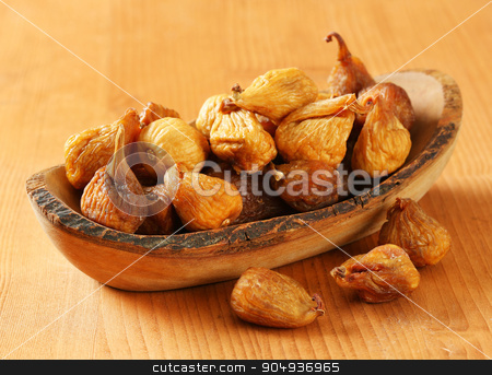 To use this stock image in your creative project, please select the size you need over to the right and click the "Add to Cart" button.
Your downloaded image will come with the Cutcaster watermark removed so don’t worry about the watermark you see on this page. Dried figs stock photo, Dried figs in olive wood bowl by Digifoodstock