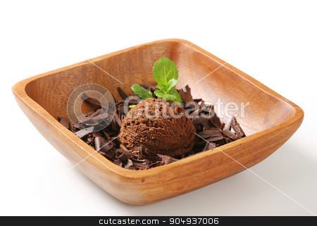 To use this stock image in your creative project, please select the size you need over to the right and click the "Add to Cart" button.
Your downloaded image will come with the Cutcaster watermark removed so don’t worry about the watermark you see on this page. Scoop of ice cream and chocolate shavings stock photo, Scoop of ice cream and chocolate shavings in wooden bowl by Digifoodstock