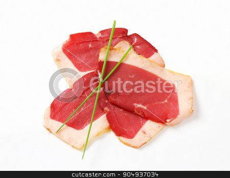 To use this stock image in your creative project, please select the size you need over to the right and click the "Add to Cart" button.
Your downloaded image will come with the Cutcaster watermark removed so don’t worry about the watermark you see on this page. Smoked duck breast slices stock photo, Thinly sliced smoked duck breast by Digifoodstock