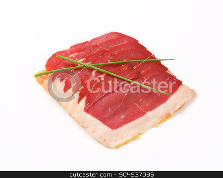 To use this stock image in your creative project, please select the size you need over to the right and click the "Add to Cart" button.
Your downloaded image will come with the Cutcaster watermark removed so don’t worry about the watermark you see on this page. Smoked duck breast slices stock photo, Thinly sliced smoked duck breast by Digifoodstock