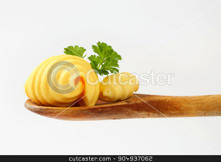 To use this stock image in your creative project, please select the size you need over to the right and click the "Add to Cart" button.
Your downloaded image will come with the Cutcaster watermark removed so don’t worry about the watermark you see on this page. Butter curls stock photo, Butter curls on wooden spoon by Digifoodstock