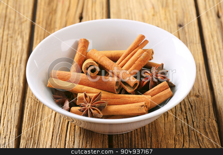 To use this stock image in your creative project, please select the size you need over to the right and click the "Add to Cart" button.
Your downloaded image will come with the Cutcaster watermark removed so don’t worry about the watermark you see on this page. Cinnamon sticks and star anise stock photo, Bowl of cinnamon sticks and star anise by Digifoodstock