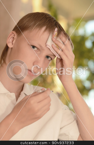 To use this stock image in your creative project, please select the size you need over to the right and click the "Add to Cart" button.
Your downloaded image will come with the Cutcaster watermark removed so don’t worry about the watermark you see on this page. teen measures the temperature of the body stock photo, Portrait of a teen measures the temperature of the body by Ruslan Huzau
