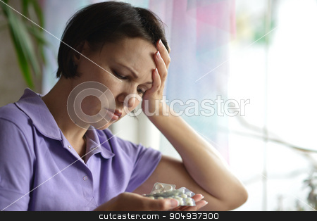 To use this stock image in your creative project, please select the size you need over to the right and click the "Add to Cart" button.
Your downloaded image will come with the Cutcaster watermark removed so don’t worry about the watermark you see on this page. Sick woman with headach stock photo, Sick woman with headache at home with pills by Ruslan Huzau