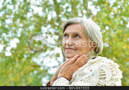 To use this stock image in your creative project, please select the size you need over to the right and click the "Add to Cart" button.
Your downloaded image will come with the Cutcaster watermark removed so don’t worry about the watermark you see on this page. senior woman in autumn park stock photo, Happy beautiful senior woman in the autumn park by Ruslan Huzau