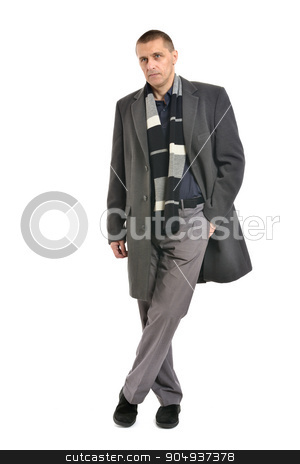 To use this stock image in your creative project, please select the size you need over to the right and click the "Add to Cart" button.
Your downloaded image will come with the Cutcaster watermark removed so don’t worry about the watermark you see on this page. Confident man posing stock photo, Confident man posing in coat on a white background by Ruslan Huzau