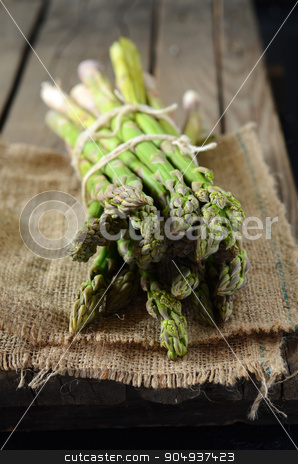 To use this stock image in your creative project, please select the size you need over to the right and click the "Add to Cart" button.
Your downloaded image will come with the Cutcaster watermark removed so don’t worry about the watermark you see on this page. Fresh green asparagus stock photo, Bunch of fresh green asparagus spears on the table by sutike
