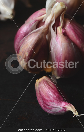 To use this stock image in your creative project, please select the size you need over to the right and click the "Add to Cart" button.
Your downloaded image will come with the Cutcaster watermark removed so don’t worry about the watermark you see on this page. raw pink garlic stock photo, Close up image of raw pink garlic by sutike