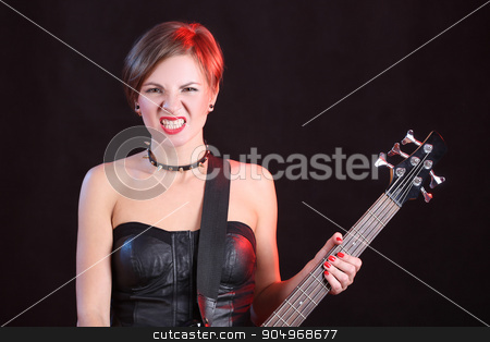 To use this stock image in your creative project, please select the size you need over to the right and click the "Add to Cart" button.
Your downloaded image will come with the Cutcaster watermark removed so don’t worry about the watermark you see on this page. Fashion girl with guitar playing rock stock photo, Fashion sexy girl with guitar bass playing rock by Kopytin Georgy