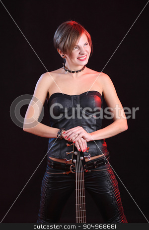 To use this stock image in your creative project, please select the size you need over to the right and click the "Add to Cart" button.
Your downloaded image will come with the Cutcaster watermark removed so don’t worry about the watermark you see on this page. Fashion girl with guitar playing rock stock photo, Fashion sexy girl with guitar bass playing rock by Kopytin Georgy