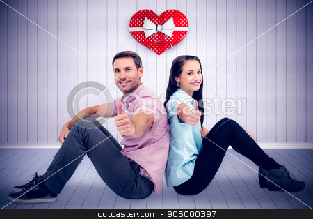 To use this stock image in your creative project, please select the size you need over to the right and click the "Add to Cart" button.
Your downloaded image will come with the Cutcaster watermark removed so don’t worry about the watermark you see on this page. Composite image of smiling couple sitting showing thumbs up stock photo, Smiling couple sitting showing thumbs up against grey room Smiling couple sitting showing thumbs up on white background by Wavebreak Media