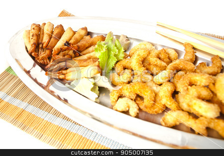 To use this stock image in your creative project, please select the size you need over to the right and click the "Add to Cart" button.
Your downloaded image will come with the Cutcaster watermark removed so don’t worry about the watermark you see on this page. Prawns stock photo, Japanese fried prawns in a steel tray, bamboo mat and chopsticks on white background by fiorellamacor