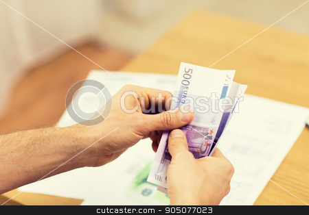 To use this stock image in your creative project, please select the size you need over to the right and click the "Add to Cart" button.
Your downloaded image will come with the Cutcaster watermark removed so don’t worry about the watermark you see on this page. close up of man hands counting money at home stock photo, savings, finances, economy and home concept - close up of man hands counting money at home by Syda Productions