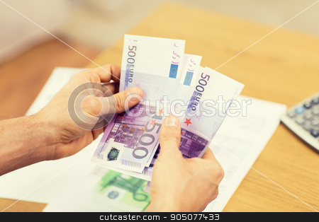 To use this stock image in your creative project, please select the size you need over to the right and click the "Add to Cart" button.
Your downloaded image will come with the Cutcaster watermark removed so don’t worry about the watermark you see on this page. close up of man hands counting money at home stock photo, savings, finances, economy and home concept - close up of man hands counting money at home by Syda Productions