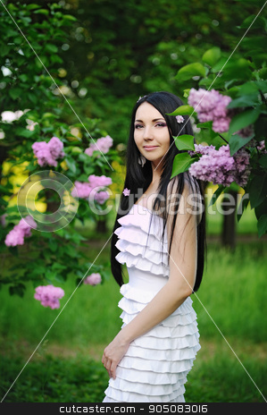 To use this stock image in your creative project, please select the size you need over to the right and click the "Add to Cart" button.
Your downloaded image will come with the Cutcaster watermark removed so don’t worry about the watermark you see on this page. Beautiful woman in the garden of blooming lilacs stock photo, Beautiful woman in the garden of blooming lilacs by timonko