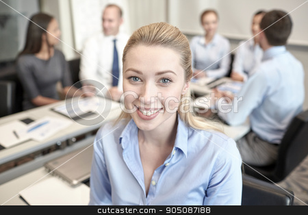 To use this stock image in your creative project, please select the size you need over to the right and click the "Add to Cart" button.
Your downloaded image will come with the Cutcaster watermark removed so don’t worry about the watermark you see on this page. group of smiling businesspeople meeting in office stock photo, business, people and teamwork concept - smiling businesswoman with group of businesspeople meeting in office by Syda Productions