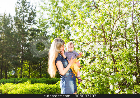 To use this stock image in your creative project, please select the size you need over to the right and click the "Add to Cart" button.
Your downloaded image will come with the Cutcaster watermark removed so don’t worry about the watermark you see on this page. Happy woman and child in the blooming spring garden. Mothers day holiday concept stock photo, Happy woman and child in the blooming spring garden.Child kissing woman. Mothers day holiday concept by Satura86
