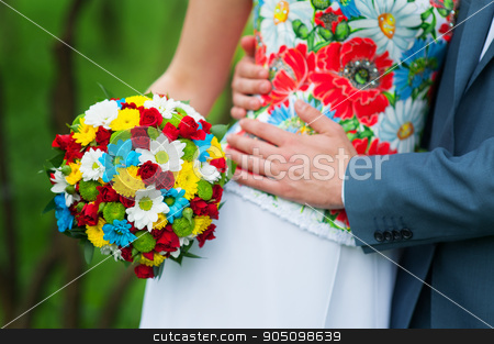 To use this stock image in your creative project, please select the size you need over to the right and click the "Add to Cart" button.
Your downloaded image will come with the Cutcaster watermark removed so don’t worry about the watermark you see on this page. Bride is holding beautiful bright wedding bouquet stock photo, Bride is holding beautiful bright wedding bouquet by timonko