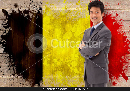 To use this stock image in your creative project, please select the size you need over to the right and click the "Add to Cart" button.
Your downloaded image will come with the Cutcaster watermark removed so don’t worry about the watermark you see on this page. Composite image of portrait of a smiling businessman with the ar stock photo, Portrait of a smiling businessman with the arms crossed against belgium flag in grunge effect by Wavebreak Media
