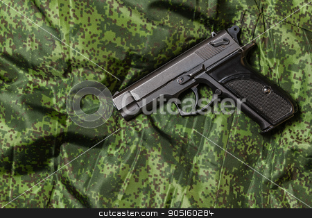 To use this stock image in your creative project, please select the size you need over to the right and click the "Add to Cart" button.
Your downloaded image will come with the Cutcaster watermark removed so don’t worry about the watermark you see on this page. semi-automatic pistol on pixel camouflage background stock photo, Weathered generic russian soviet semi-automatic 9mm pistol on pixel camouflage background by Denys Kornylov