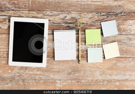 To use this stock image in your creative project, please select the size you need over to the right and click the "Add to Cart" button.
Your downloaded image will come with the Cutcaster watermark removed so don’t worry about the watermark you see on this page. close up of notebook, stickers and tablet pc stock photo, business, education, objects and technology concept - close up of notebook, tablet pc and stickers on table by Syda Productions
