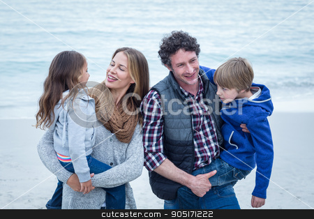 To use this stock image in your creative project, please select the size you need over to the right and click the "Add to Cart" button.
Your downloaded image will come with the Cutcaster watermark removed so don’t worry about the watermark you see on this page. Parents carrying children while enjoying at beach stock photo, Cheerful parents carrying children while enjoying at beach by Wavebreak Media