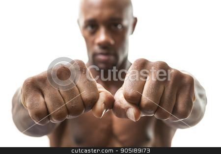 To use this stock image in your creative project, please select the size you need over to the right and click the "Add to Cart" button.
Your downloaded image will come with the Cutcaster watermark removed so don’t worry about the watermark you see on this page. Man Showing Fists and Knuckles stock photo, Muscular man of African descent isolated over a white background showing a closeup of his fists and knuckles. Shallow depth of field by Todd Arena