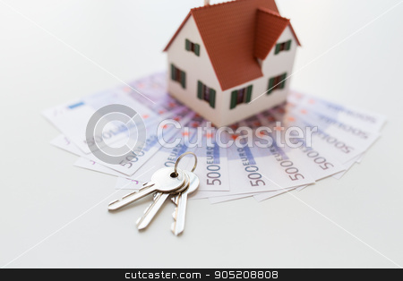 To use this stock image in your creative project, please select the size you need over to the right and click the "Add to Cart" button.
Your downloaded image will come with the Cutcaster watermark removed so don’t worry about the watermark you see on this page. close up of home model, money and house keys stock photo, mortgage, investment, real estate and property concept - close up of home model, money and house keys by Syda Productions