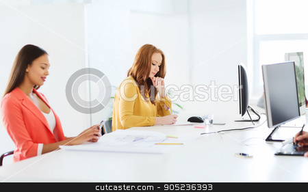 To use this stock image in your creative project, please select the size you need over to the right and click the "Add to Cart" button.
Your downloaded image will come with the Cutcaster watermark removed so don’t worry about the watermark you see on this page. creative female office worker writing to notebook stock photo, business, startup and people concept - businesswoman or creative female office worker with computer writing to notebook by Syda Productions