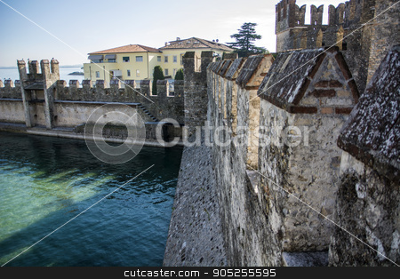 To use this stock image in your creative project, please select the size you need over to the right and click the "Add to Cart" button.
Your downloaded image will come with the Cutcaster watermark removed so don’t worry about the watermark you see on this page. Old walls around Sirmione, italian town on Lake Garda stock photo, Old walls around Sirmione, italian town on Lake Garda. Historical view of Italy by Stefano Cavoretto