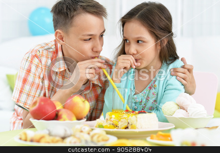 To use this stock image in your creative project, please select the size you need over to the right and click the "Add to Cart" button.
Your downloaded image will come with the Cutcaster watermark removed so don’t worry about the watermark you see on this page. Happy children with cake stock photo, Happy children with cake at birthday party by Ruslan Huzau