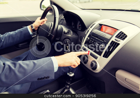 To use this stock image in your creative project, please select the size you need over to the right and click the "Add to Cart" button.
Your downloaded image will come with the Cutcaster watermark removed so don’t worry about the watermark you see on this page. close up of man driving car and emergency button stock photo, transport, business trip, breakdown, technology and people concept - close up of young man in suit driving car and switching emergency signal button by Syda Productions
