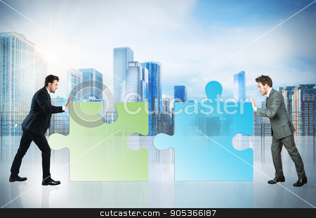 To use this stock image in your creative project, please select the size you need over to the right and click the "Add to Cart" button.
Your downloaded image will come with the Cutcaster watermark removed so don’t worry about the watermark you see on this page. Business partner stock photo, Businessmen push a pieces of puzzle fit together by Federico Caputo
