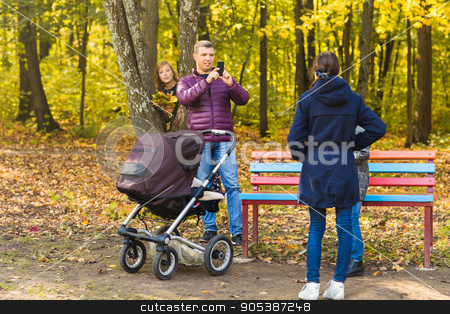 To use this stock image in your creative project, please select the size you need over to the right and click the "Add to Cart" button.
Your downloaded image will come with the Cutcaster watermark removed so don’t worry about the watermark you see on this page. family make photo stock photo, family make photo in the autumn nature by Satura86