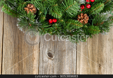 To use this stock image in your creative project, please select the size you need over to the right and click the "Add to Cart" button.
Your downloaded image will come with the Cutcaster watermark removed so don’t worry about the watermark you see on this page. Christmas border with decorative wreath on rustic wooden boards stock photo, Christmas border with decorative wreath on rustic wooden boards. by tab62