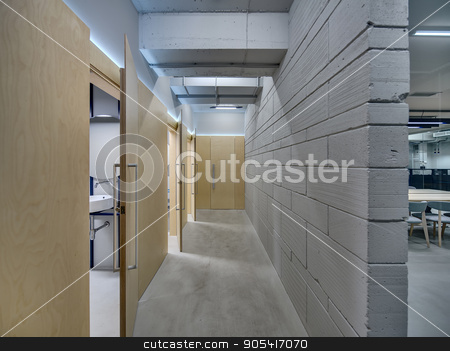 To use this stock image in your creative project, please select the size you need over to the right and click the "Add to Cart" button.
Your downloaded image will come with the Cutcaster watermark removed so don’t worry about the watermark you see on this page. Corridor in loft style stock photo, Luminous corridor in the office in a loft style. There is a gray brick wall and wooden walls with several wooden doors. Three doors are open. Indoors. Horizontal by bezikus