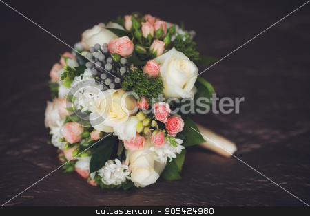 To use this stock image in your creative project, please select the size you need over to the right and click the "Add to Cart" button.
Your downloaded image will come with the Cutcaster watermark removed so don’t worry about the watermark you see on this page. Close up of beautiful wedding bouquet on dark background stock photo, Close up of beautiful wedding bouquet, dark background by HDesert