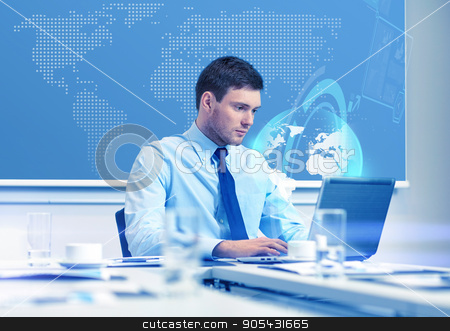 To use this stock image in your creative project, please select the size you need over to the right and click the "Add to Cart" button.
Your downloaded image will come with the Cutcaster watermark removed so don’t worry about the watermark you see on this page. businessman with laptop working in office stock photo, business, people and work concept - businessman with laptop computer and virtual globe hologram in office by Syda Productions