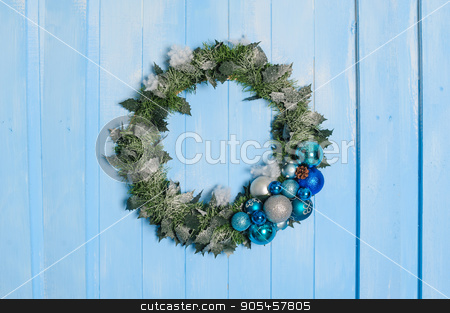 To use this stock image in your creative project, please select the size you need over to the right and click the "Add to Cart" button.
Your downloaded image will come with the Cutcaster watermark removed so don’t worry about the watermark you see on this page. Christmas decorative circle from fir branches stock photo, Christmas decorative circle from fir branches on door by timonko