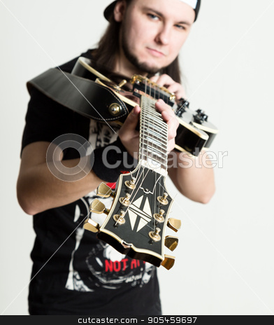 To use this stock image in your creative project, please select the size you need over to the right and click the "Add to Cart" button.
Your downloaded image will come with the Cutcaster watermark removed so don’t worry about the watermark you see on this page. guitarists of a rock band with guitar, close-up neck stock photo, guitarists of a rock band with guitar, close-up guitar neck. by Alexander