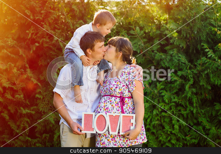 To use this stock image in your creative project, please select the size you need over to the right and click the "Add to Cart" button.
Your downloaded image will come with the Cutcaster watermark removed so don’t worry about the watermark you see on this page. young family in a summer Park hold Love stock photo, young family in a summer Park hold wooden word Love by timonko