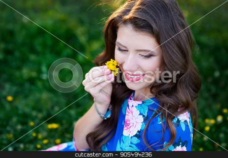 To use this stock image in your creative project, please select the size you need over to the right and click the "Add to Cart" button.
Your downloaded image will come with the Cutcaster watermark removed so don’t worry about the watermark you see on this page. beautiful young woman holding a flower stock photo, beautiful young woman holding a flower in summer park by timonko
