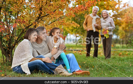 To use this stock image in your creative project, please select the size you need over to the right and click the "Add to Cart" button.
Your downloaded image will come with the Cutcaster watermark removed so don’t worry about the watermark you see on this page. big family on picnic stock photo, Portrait of a big family on picnic in autumn by Ruslan Huzau