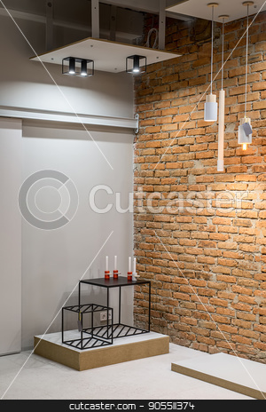 To use this stock image in your creative project, please select the size you need over to the right and click the "Add to Cart" button.
Your downloaded image will come with the Cutcaster watermark removed so don’t worry about the watermark you see on this page. Loft style interior stock photo, Interior in a loft style with gray and brick walls. There are hanging glowing lamps, black small metal tables with candlesticks. Vertical by bezikus