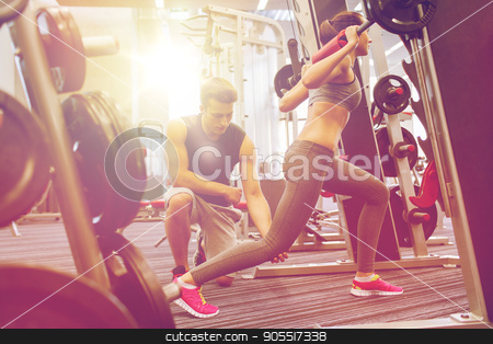 To use this stock image in your creative project, please select the size you need over to the right and click the "Add to Cart" button.
Your downloaded image will come with the Cutcaster watermark removed so don’t worry about the watermark you see on this page. man and woman with barbell flexing muscles in gym stock photo, sport, fitness, teamwork, weightlifting and people concept - young man and personal trainer with barbell flexing muscles in gym by Syda Productions