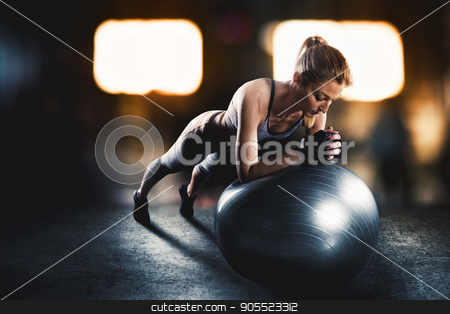 To use this stock image in your creative project, please select the size you need over to the right and click the "Add to Cart" button.
Your downloaded image will come with the Cutcaster watermark removed so don’t worry about the watermark you see on this page. Workout with fitness ball stock photo, Muscular woman on a fitness ball with sports underwear at the gym by Federico Caputo