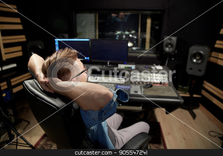 To use this stock image in your creative project, please select the size you need over to the right and click the "Add to Cart" button.
Your downloaded image will come with the Cutcaster watermark removed so don’t worry about the watermark you see on this page. man at mixing console in music recording studio stock photo, music, technology, people and equipment concept - man at mixing console in sound recording studio by Syda Productions