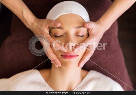 To use this stock image in your creative project, please select the size you need over to the right and click the "Add to Cart" button.
Your downloaded image will come with the Cutcaster watermark removed so don’t worry about the watermark you see on this page. woman having face and head massage at spa stock photo, people, beauty, lifestyle and relaxation concept - beautiful young woman lying with closed eyes and having face and head massage at spa by Syda Productions